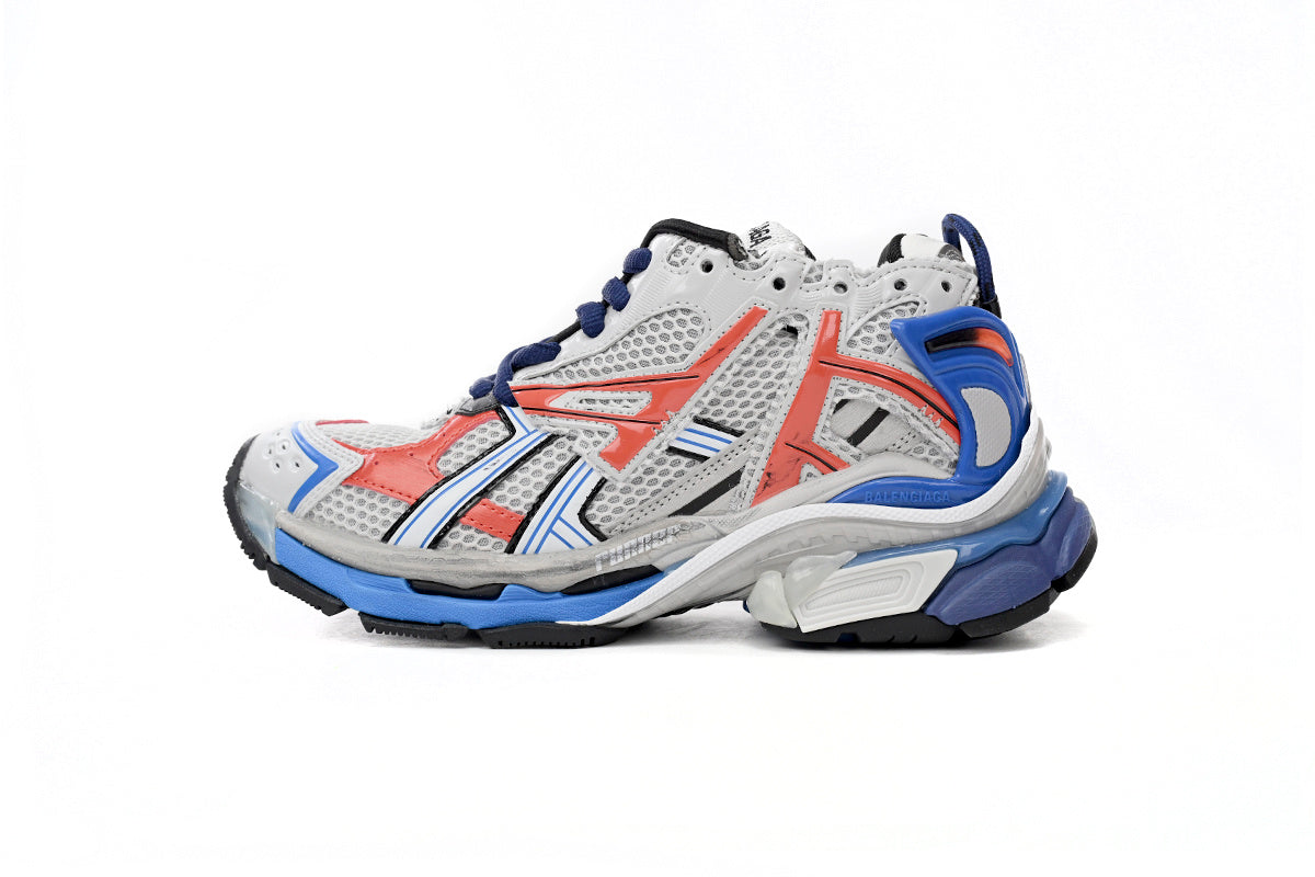 Balenciaga men's shoes Track Runner Sneaker ¨C Distressed Low-Top balenciaga runners  White, Red, and Blue