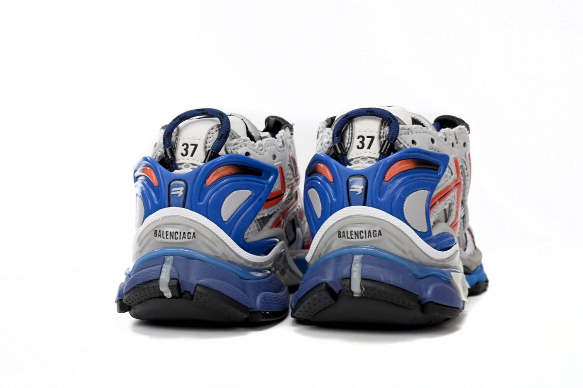 Balenciaga men's shoes Track Runner Sneaker ¨C Distressed Low-Top balenciaga runners  White, Red, and Blue