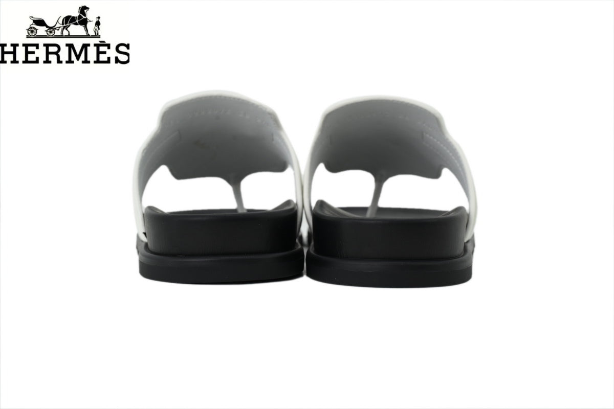 Herm¨¨s female slides White Leather Flip-Flop Slide with Metal Buckle